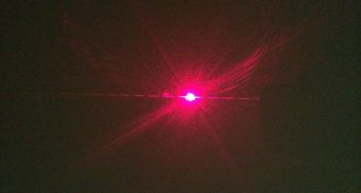 Laser pointer light scatter
