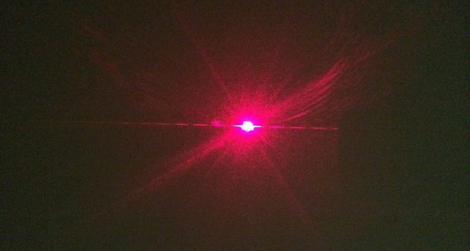 Laser pointer light scatter
