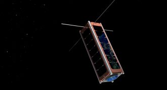 This illustration shows what a CubeSat would look like in space. Used in recent years for many low-cost projects, these mini satellites might one day scout for killer asteroids.