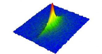 Stanford physicists used images like this one, showing a clumping of rubidium atoms, to determine that those atoms had achieved a record-low temperature.
