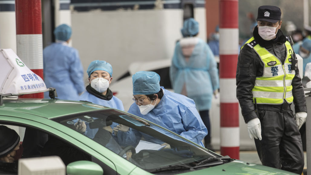 Health workers outside of Shanghai