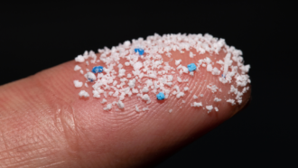 microplastics on finger