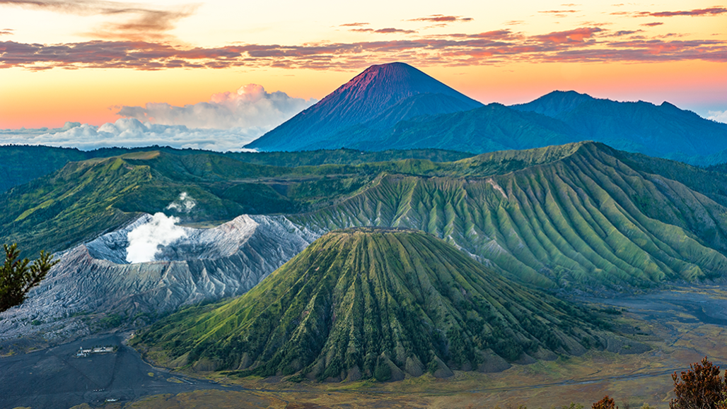 an aerial image of Indonesia’s Bromo Tengger Semeru National Park with an orange sky