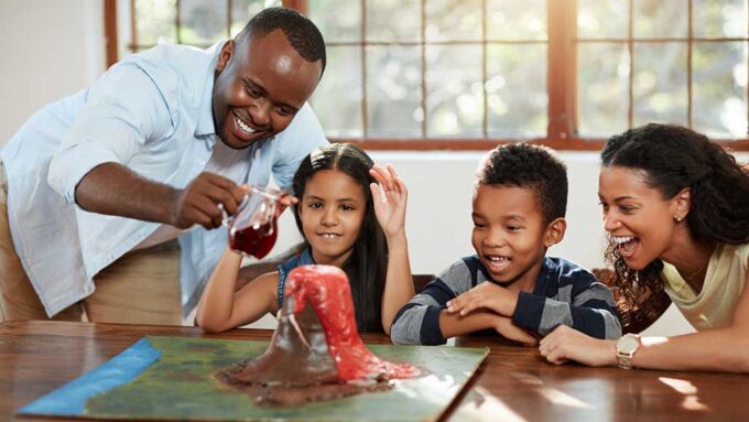 a family making a volcano at home