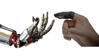an image of a robot hand touching a human hand wearing a glove on one finger