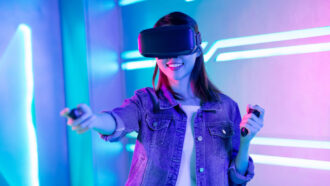 a girl wearing VR goggles