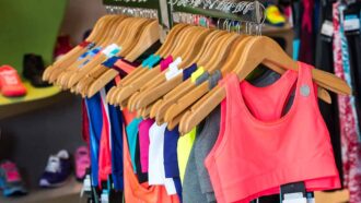 women's sports clothing on a clothing rack