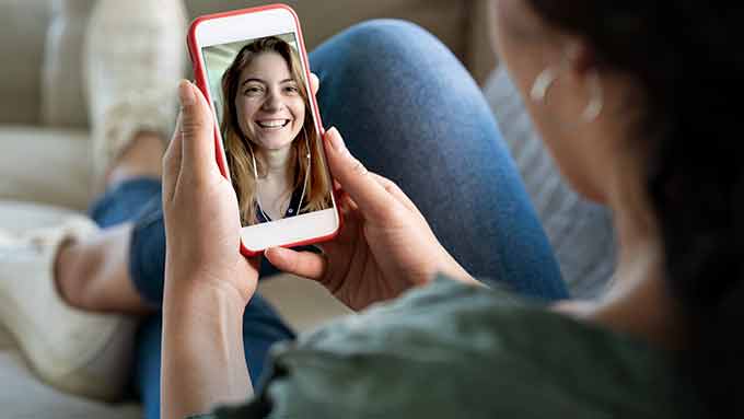 a girl video chatting with a friend