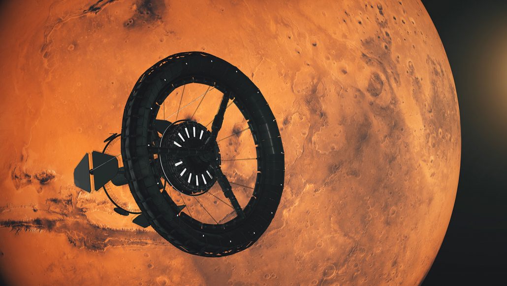 an illustration of a space station with a large rotating ring orbiting above Mars