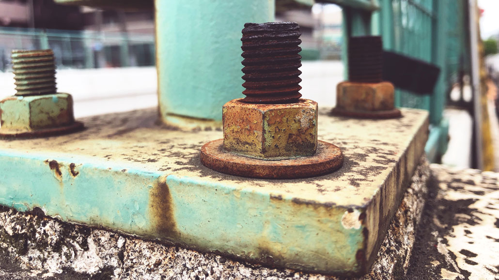 a very large and very rust bolt