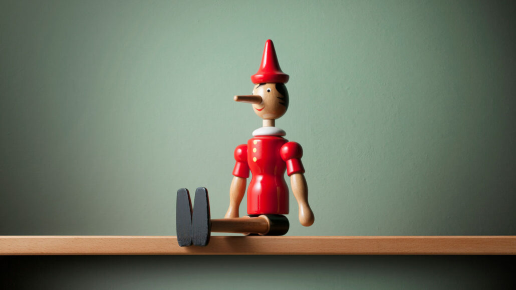 A Pinocchio doll sits on a shelf