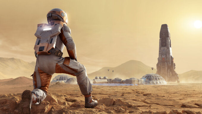 an astronaut in the foreground kneels on the red terrain of Mars and looks at a rocket ship parked in the distance