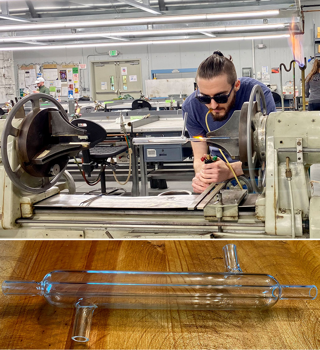 a photo of a young man with a ponytail using a machine to create laboratory glassware