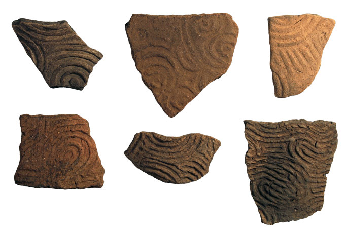 six pottery fragments with varied patterns