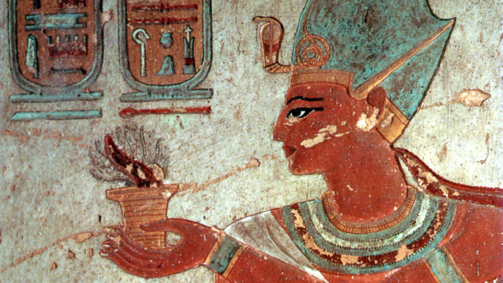 painted relief of Ramses III holding a lit incense burner