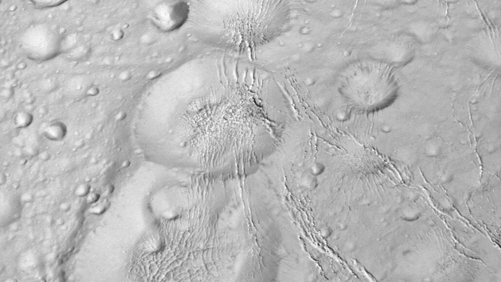 A chain of craters on Enceladus looks like a Saturnian snowman.