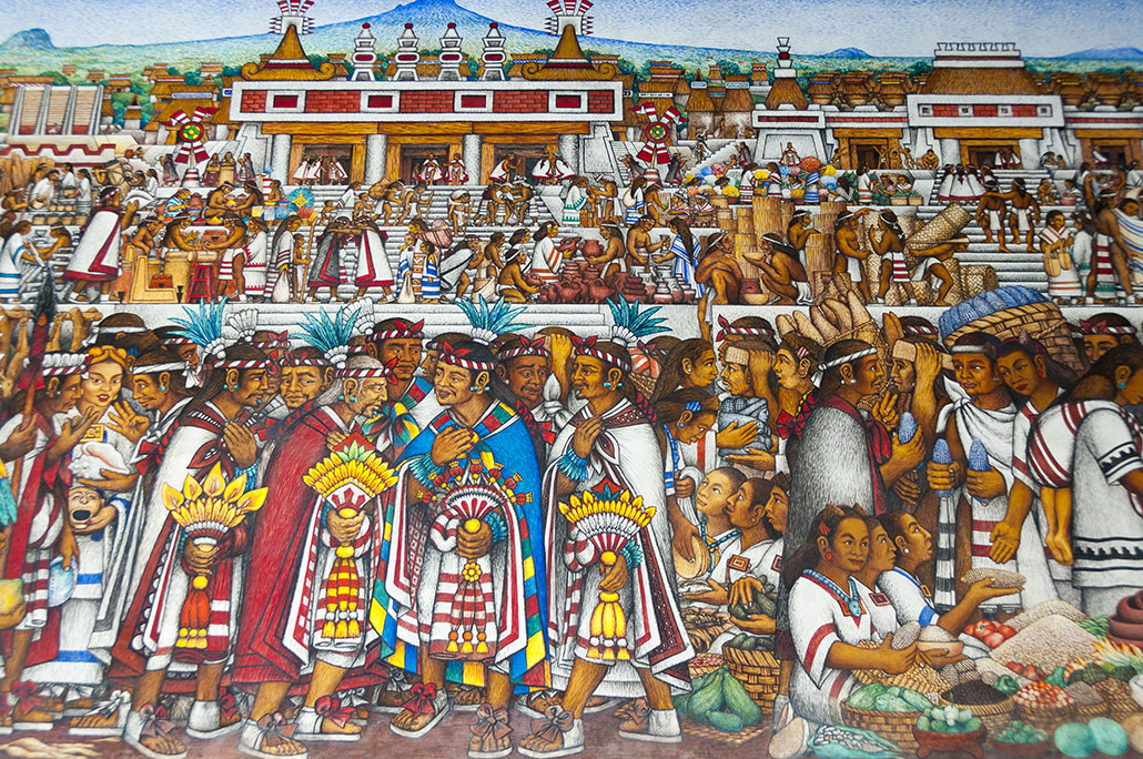 a mural showing the history of the Tlaxcala people, this scene shows a gathering of both leaders and common folk at a crowded open-air market