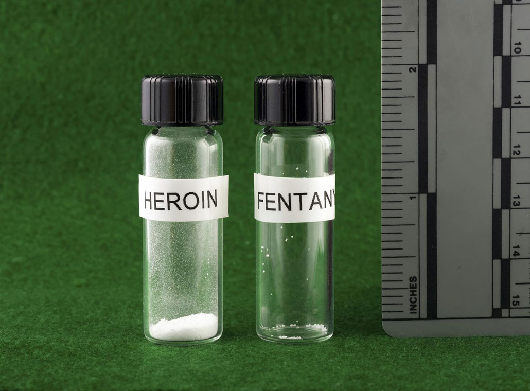 two vials one with heroin, and one with fentanyl. Both indicate the amount of 