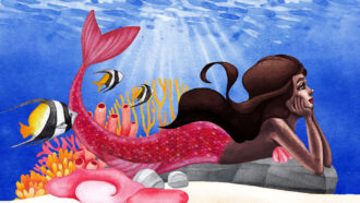 a watercolor illustration of a mermaid with dark brown skin, brown hair, and a red tail. She is holding her head in her hands and laying on a rock next to a coral outcriop. Tropical fish swim behind her.
