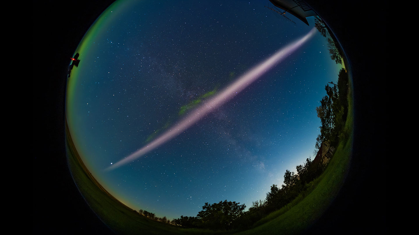 STEVE airglow streaking across night sky