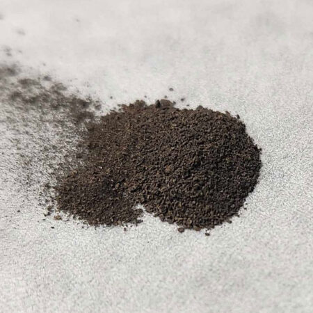 a pile of dark brown to black powder