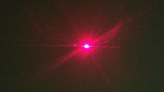 Laser pointer light scatter