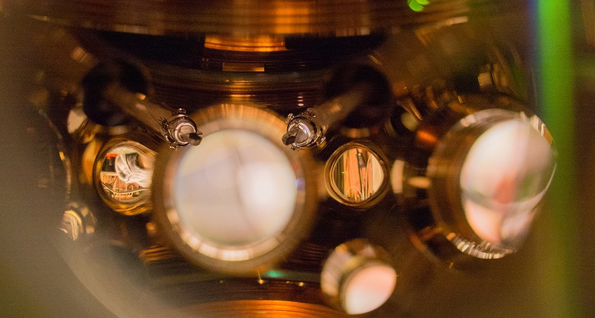 A new atomic clock contains two ultrasensitive thermometers (center) that enable scientists to reduce any timekeeping errors due to heat from the surrounding environment.