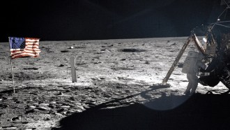 Neil Armstrong (right) seen wearing his pressure suit on the lunar surface July 20, 1969. That suit, now a prized artifact in the Smithsonian Institution’s collection of space wear, is deteriorating. Museum scientists are working hard to limit further d