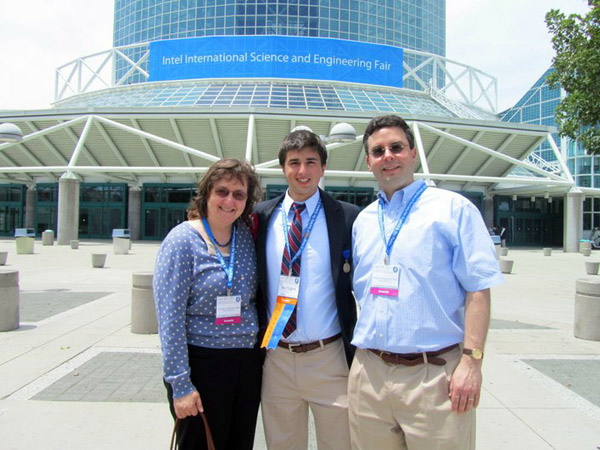 Matthew McIntyre poses with his parents