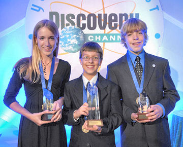 This year, Erik Gustafson, 11, (center) became the youngest person ever to win DCYSC. Katherine Strube, 14, (left) earned second place. Fourteen-year-old Ambrose Soehn took third place.
