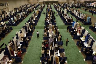 Rows and rows of project displays fill the exhibit hall at the Intel ISEF in Portland, Ore.