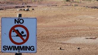 Unusually hot weather, such as the drought that dried up this swimming hole in Australia, is on the rise. So are storms that dump heavy amounts of precipitation. Our role in changing Earth’s climate is largely to blame for these weather extremes.