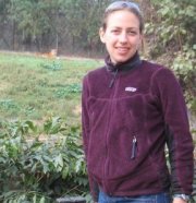 Emily visits a tiger at a zoo in India.