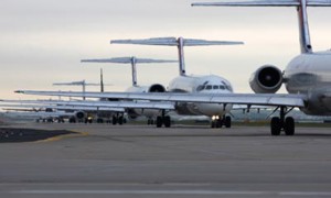 Planes await takeoff at Hartsfield-Jackson Atlanta International Airport, one of the busiest in the world. Researchers recently found that sunlight worsens the pollution from idling planes.