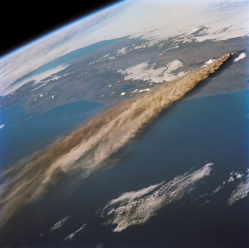 a satellite view of the Eart showing plumes of volcanic ash