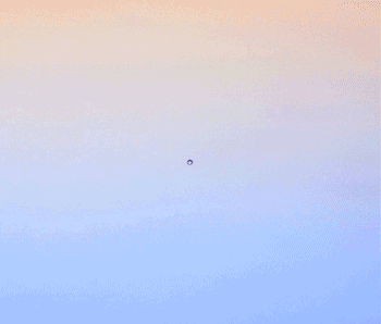 an animated image of a snowflake forming