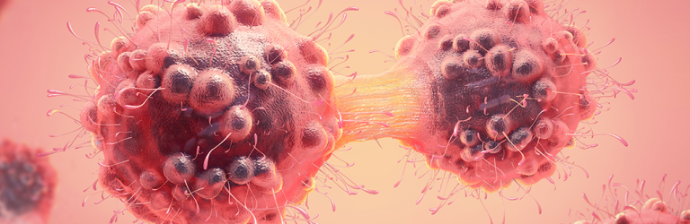 an illustration of cancer cells dividing