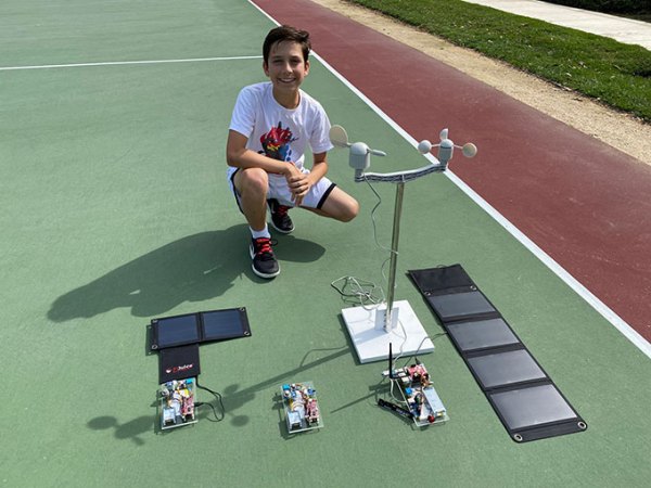 Ryan Honary shows off his wildfire detector