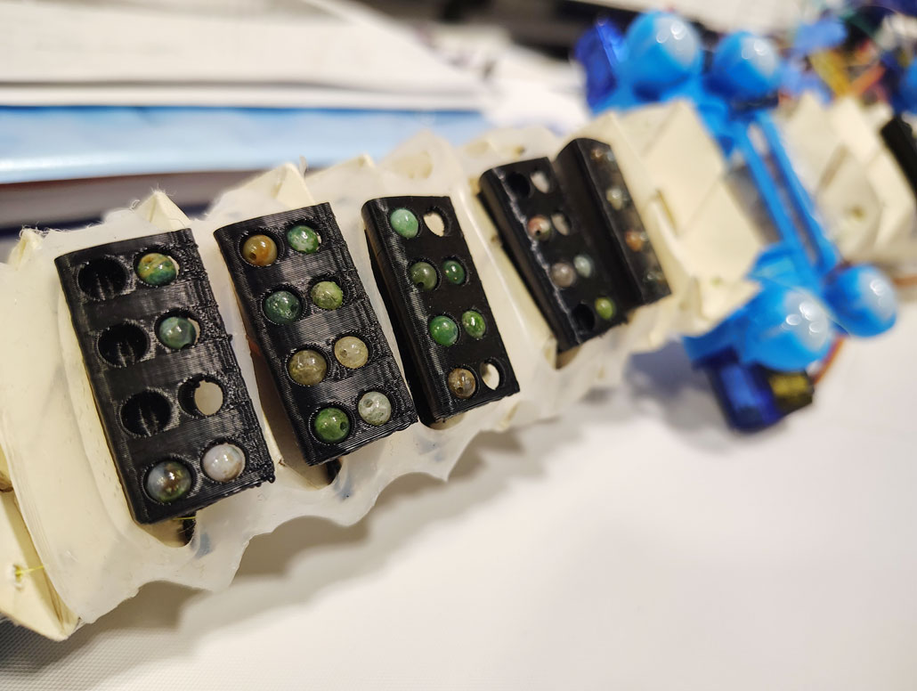 a closeup showing the 'textured scales' on the underside of the snake robot