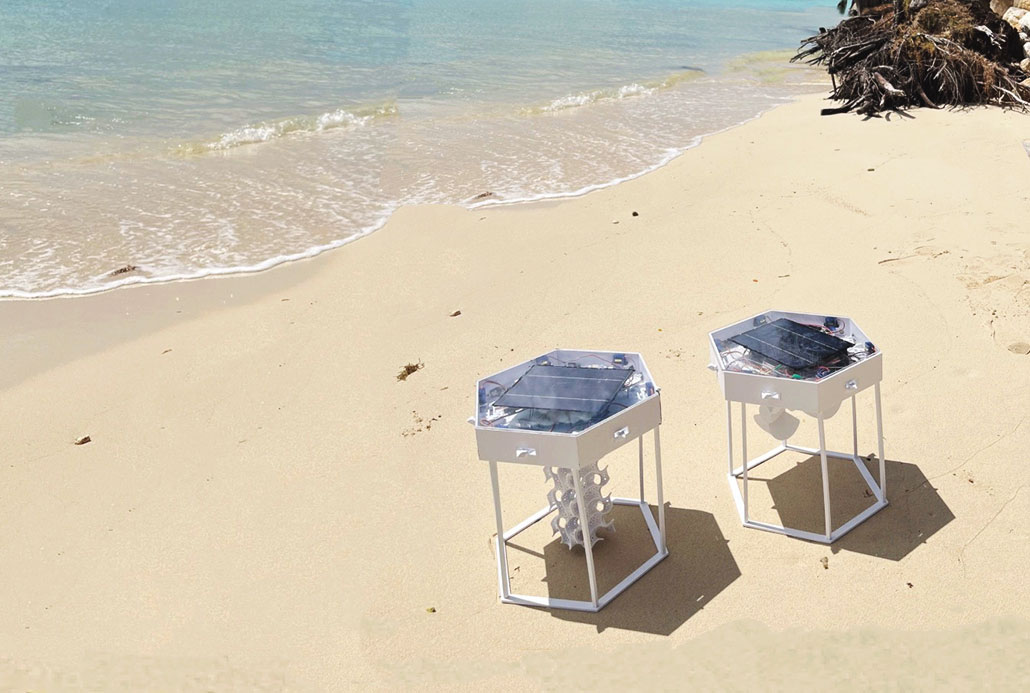 a coral cell and a power cell sitting on a beach