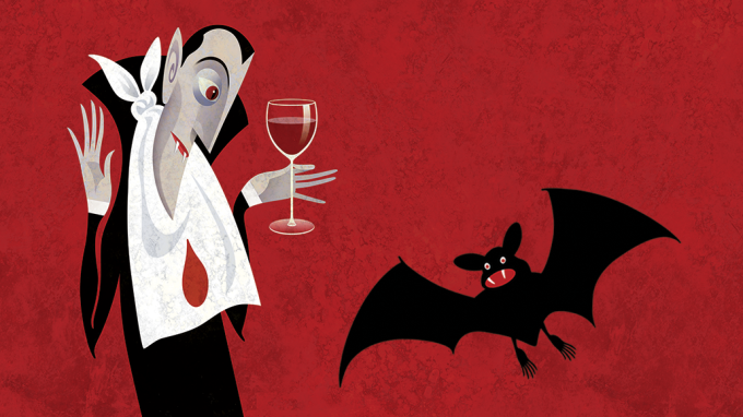An illustration shows a vampire looking at a black, cartoon bat. The vampire is holding a glass filled with blood. He's wearing a blood-stained napkin tied around his neck.