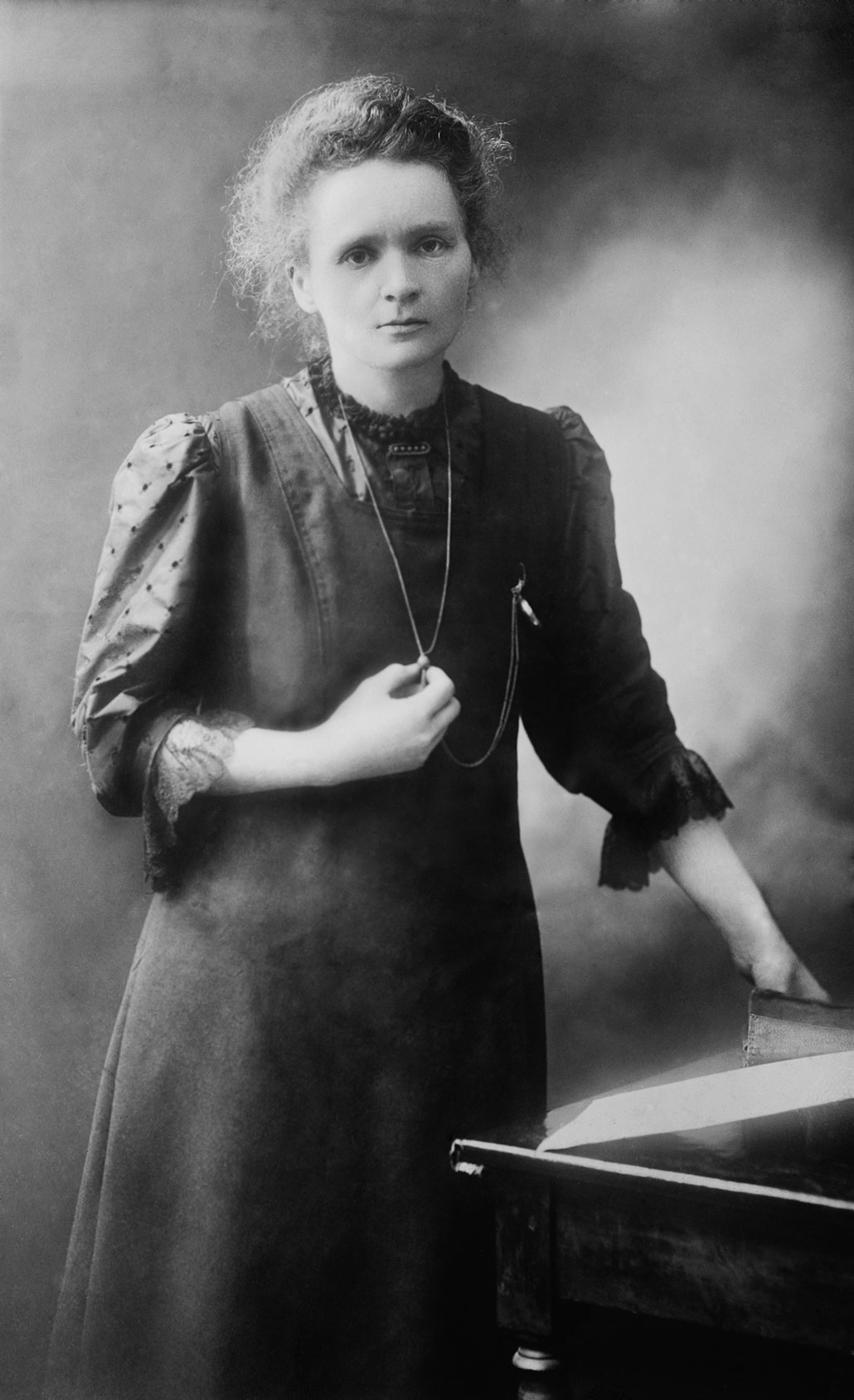a portrait of Marie Curie in black and white