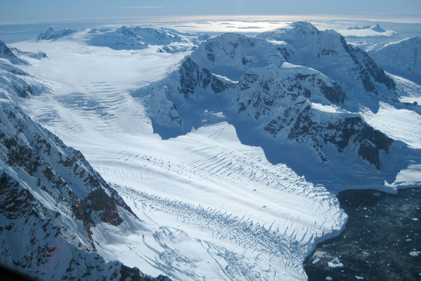 an aerial view of glaciers in Antarctica