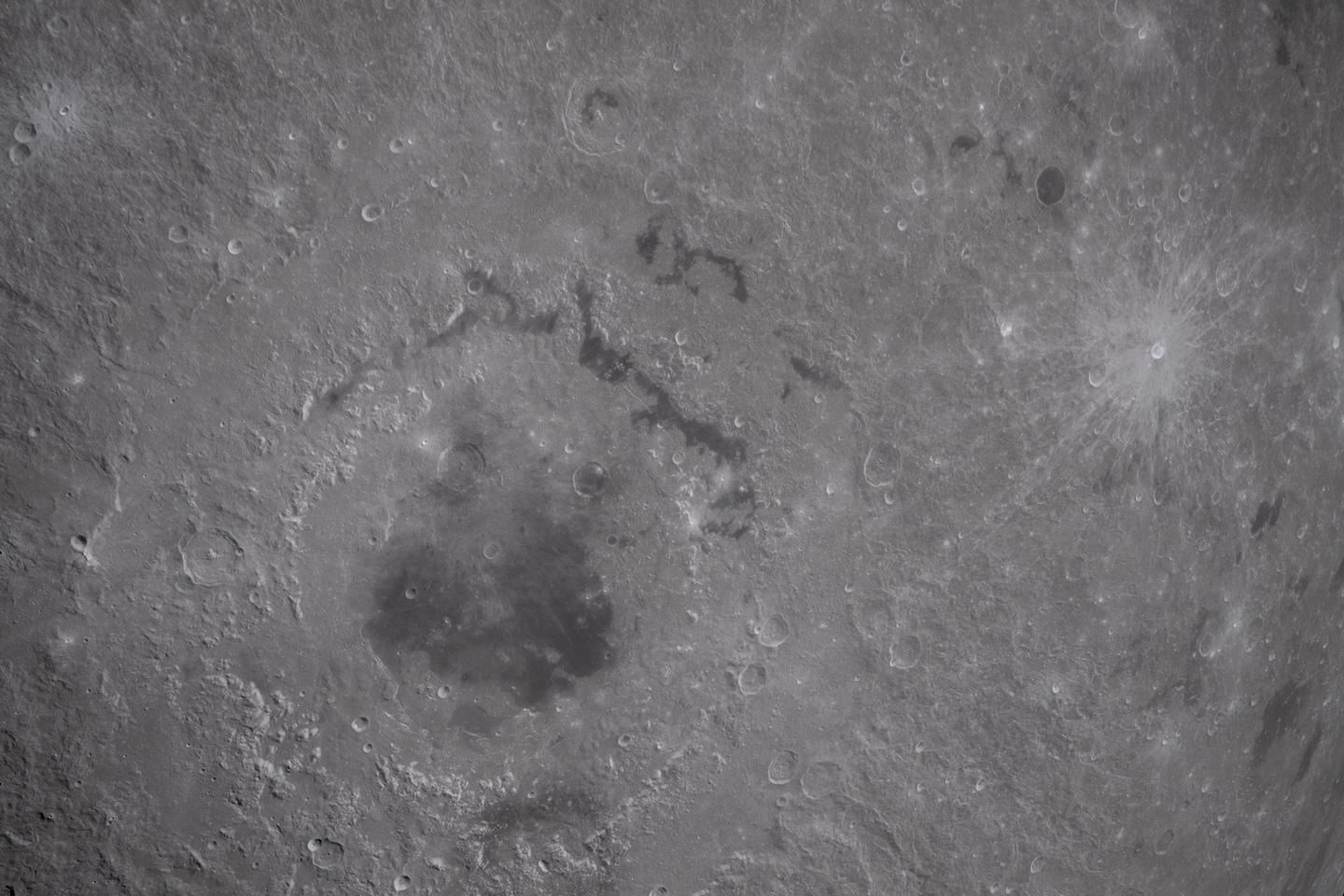 a deep crater on the moon made of concentric circles