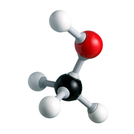 This is an model of methanol's molecular structure. The black sphere is carbon, white is hydrogen and red is oxygen.
