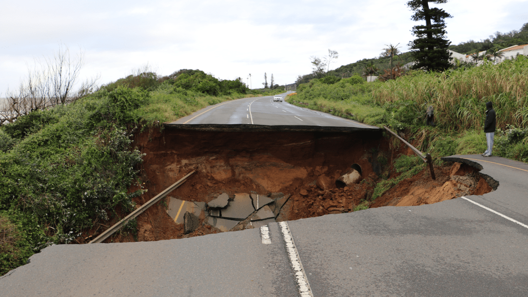 road splits in two, one part collapsed down