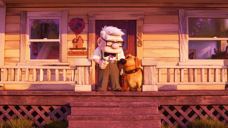 A video still from the movie Up shows Carl, an older adult man, sitting on a porch with the golden retriever, Dug.
