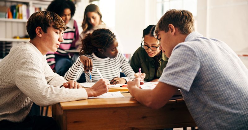 a photo of a group of diverse students participating in a study group