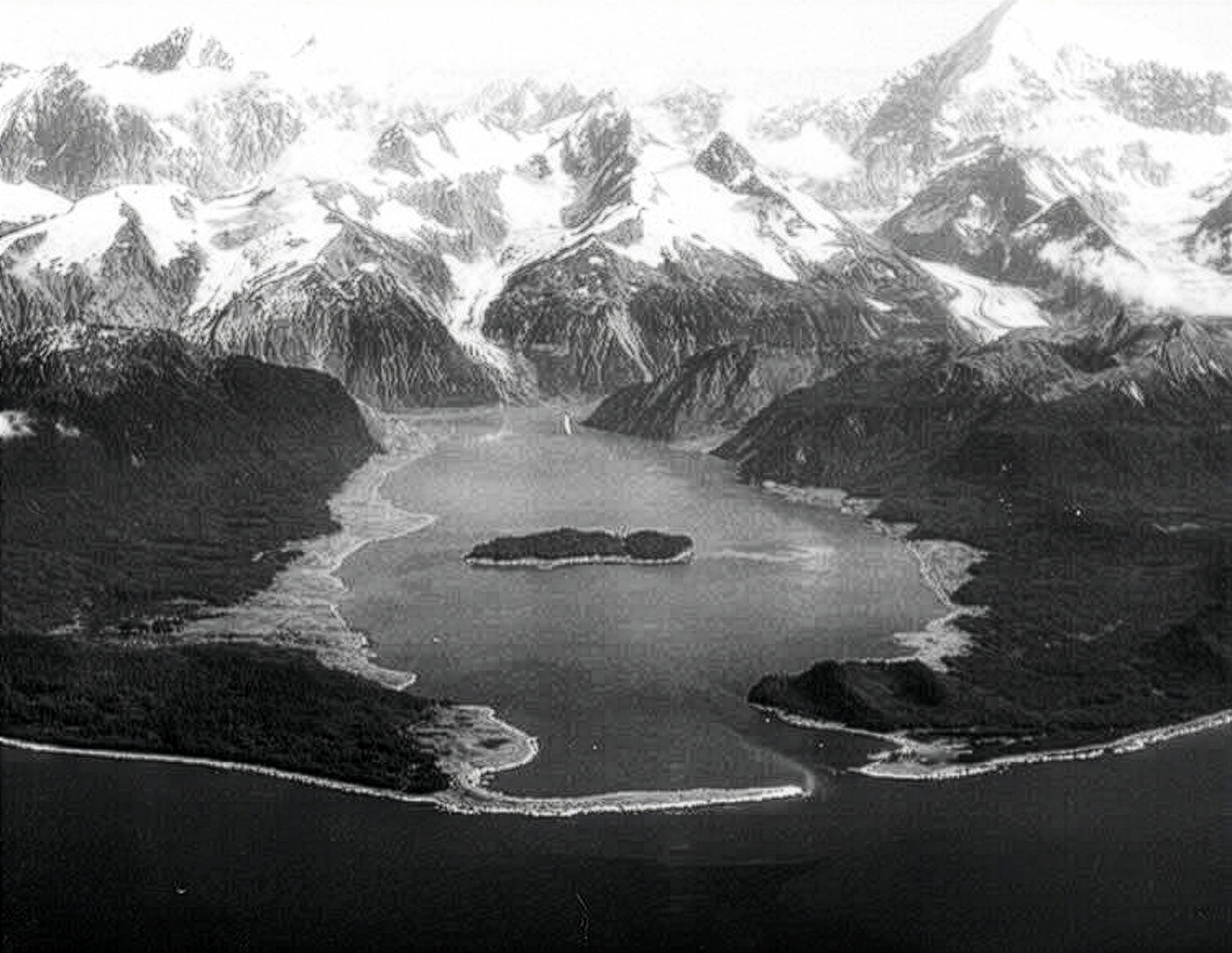 an archival black and white photo of Lituya Bay