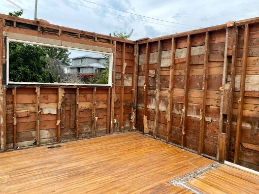 a deconstruction of an interior wall in progress